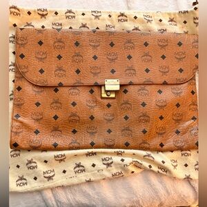 MCM Cognac Leather Pouch with Gold Accents